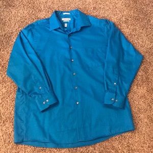 Never been worn! Blue, men’s button down shirt.